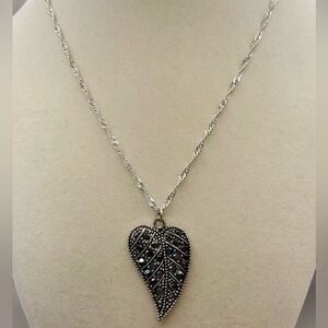 Silver tone marcasite leaf pendant necklace. 16 inches long with 3 inch extend